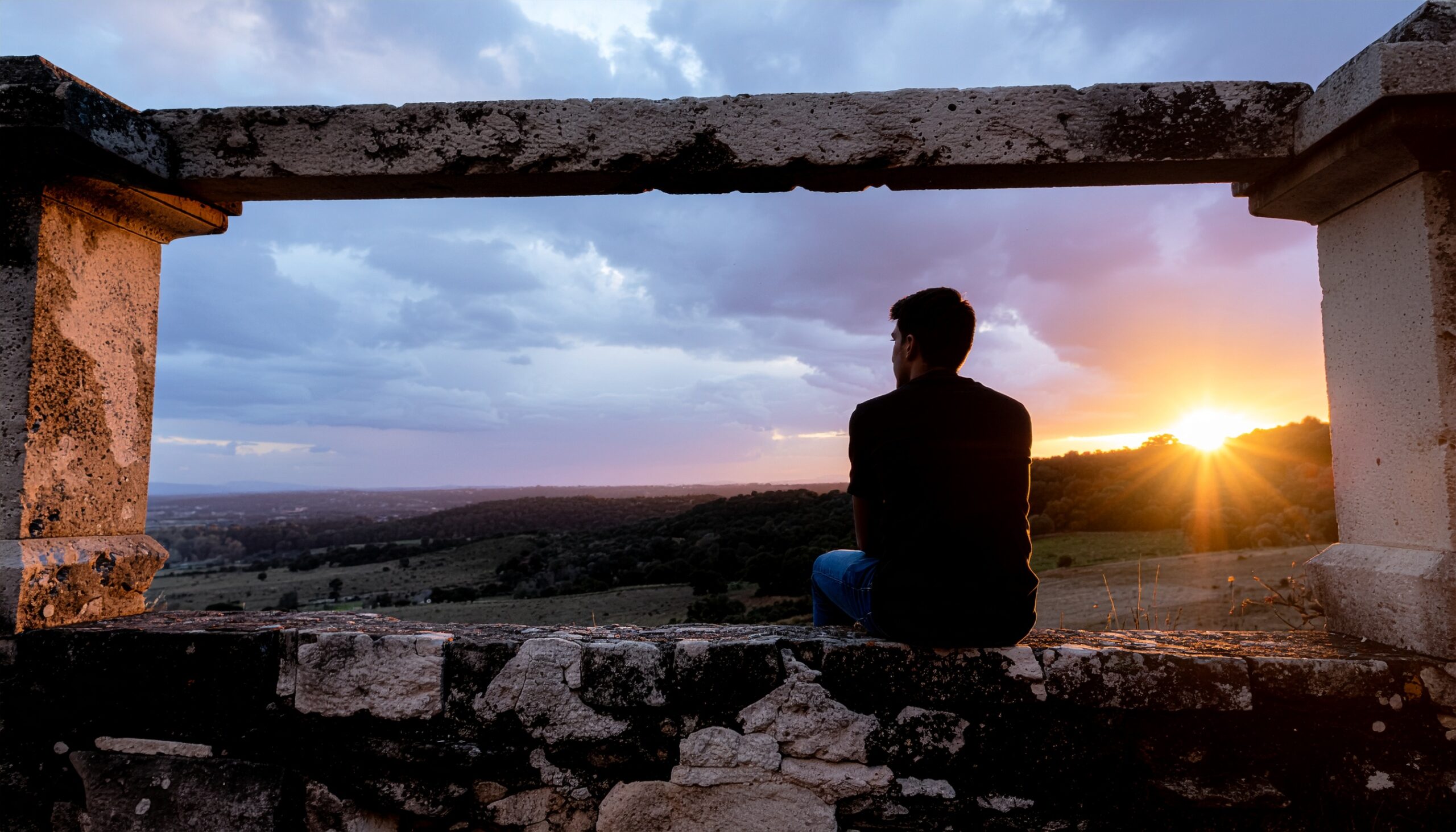 A solitary figure waits alone